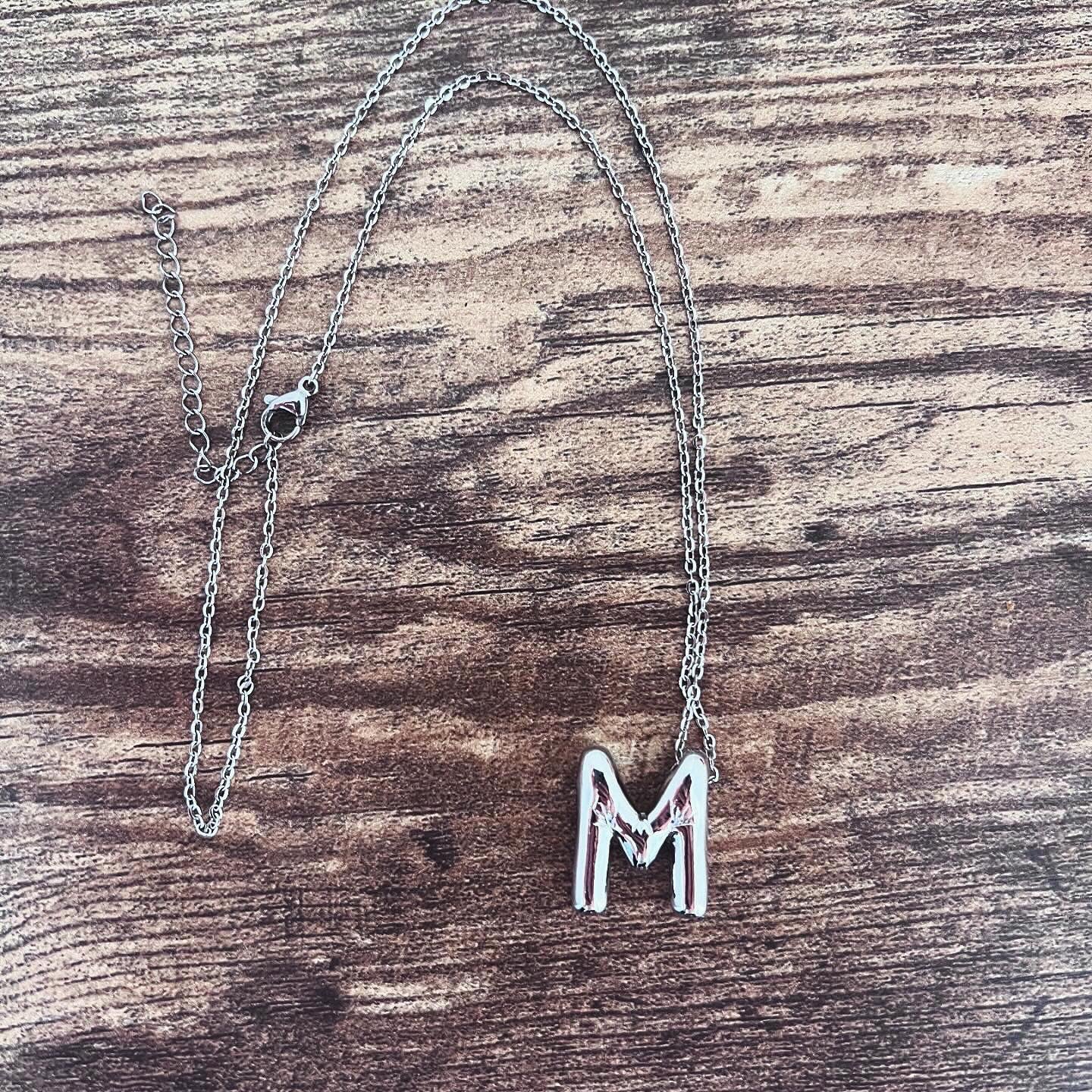 “Sparkle” silver initial necklace