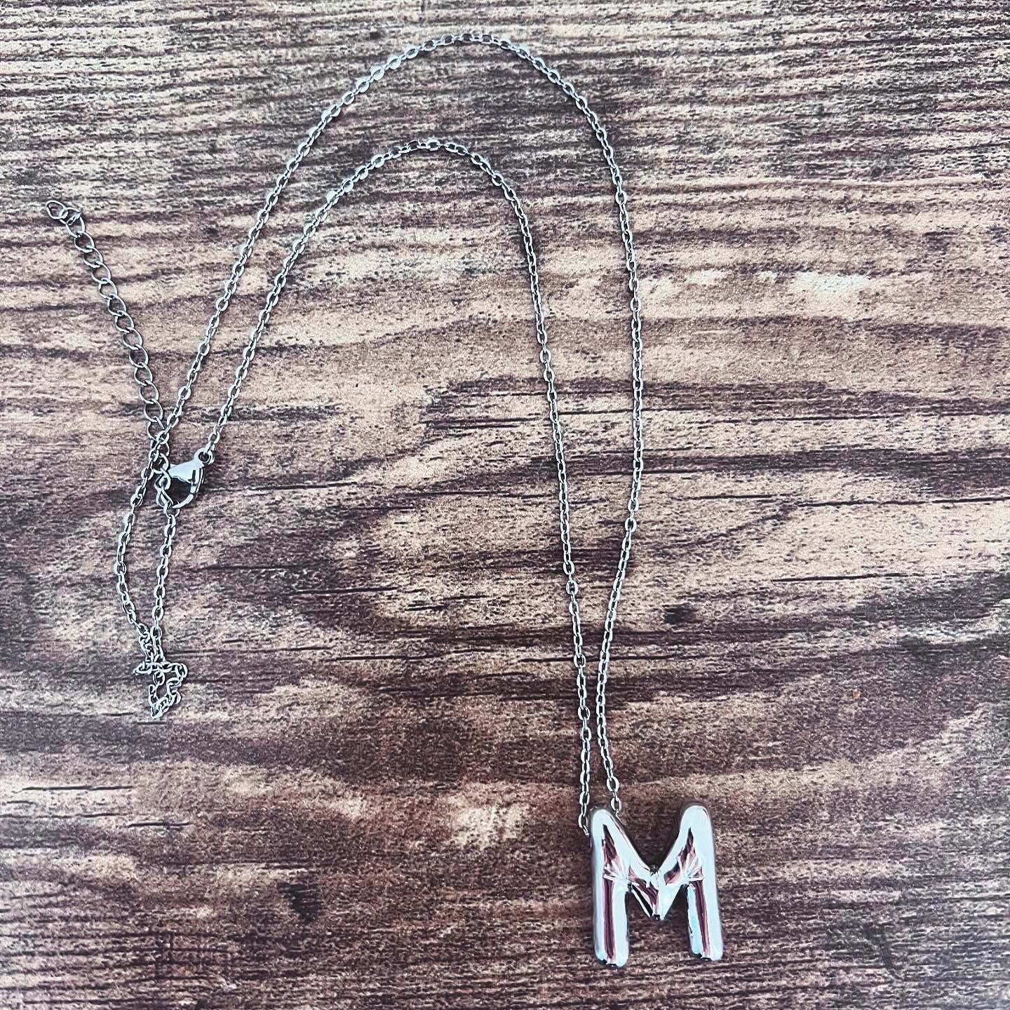 “Sparkle” silver initial necklace