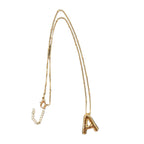 “Shine” gold initial necklace