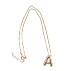 “Shine” gold initial necklace