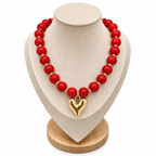 Double Heart Red Beaded Necklace on cream jewelry display