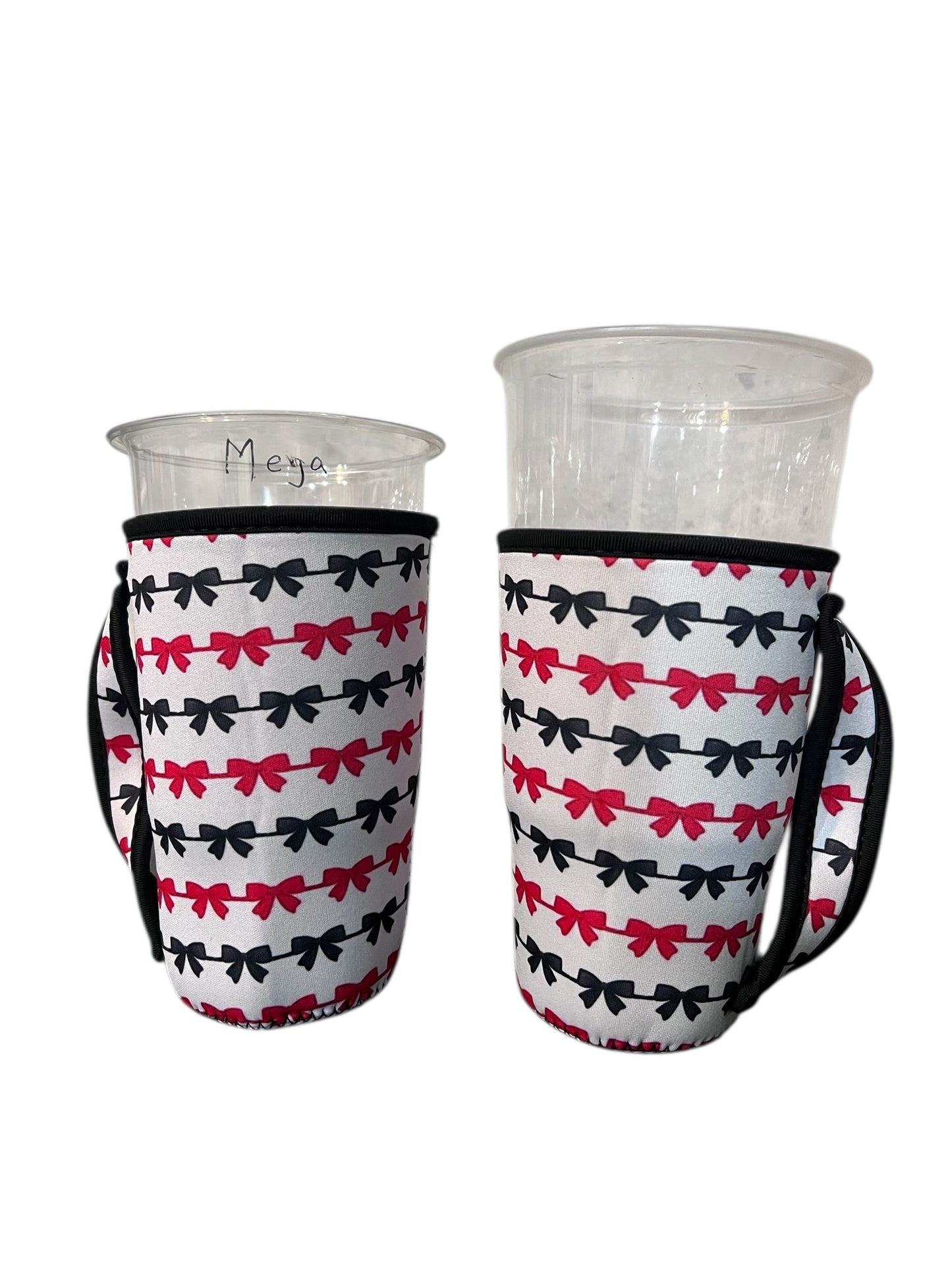 Tea sleeve with red and black bows and alternating lines