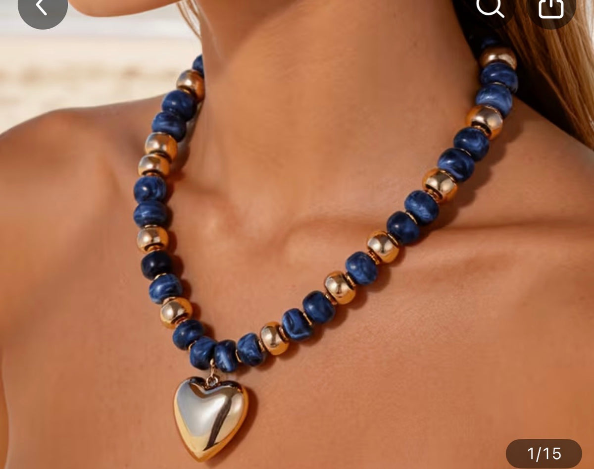 Navy heart necklace with gold heart pendant